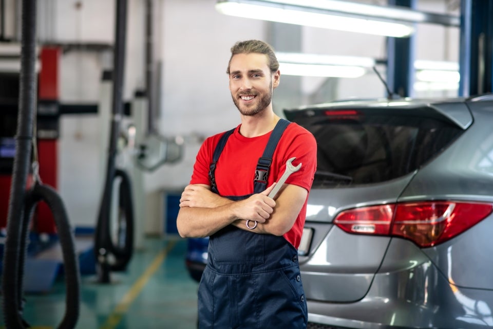 Mercedes-Benz service technician standing in the service department