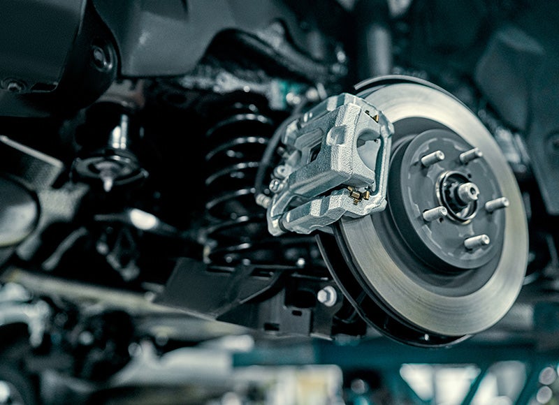 Mercedes-Benz brake caliper and rotor assembly during a brake service